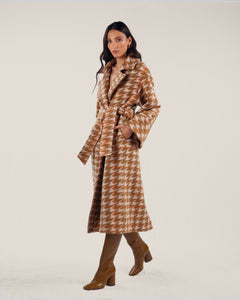 Cozy winter coat with earthy checked pattern with hints of orange featuring detachable belt, deep pockets and full lining.