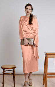 Peach wedding guest satin dress with long sleeves