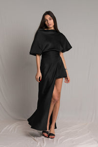 Black asymmetric satin silk wedding guest dress with short wide sleeves and cowl neckline