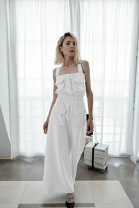 Made to measure white linen jumpsuit with cargo pockets and bareback - Custom Made - Bastet Noir