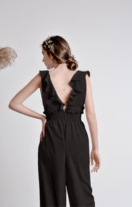 Black wide leg, sleeveless jumpsuit with ruffle and smocking details