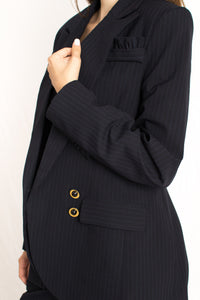 navy blue striped structured blazer with gold buttons and frill details