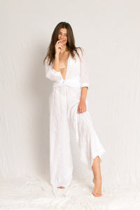 White sheer cotton beach jumpsuit with sleeves, open V neckline and georgette silk lining
