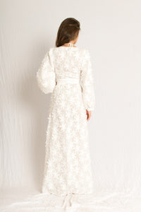 White 3d print long sleeve dress with front slit and a V neckline