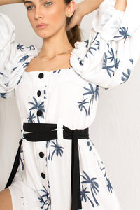 white midi palm tree print dress with side slits and peasant sleeves